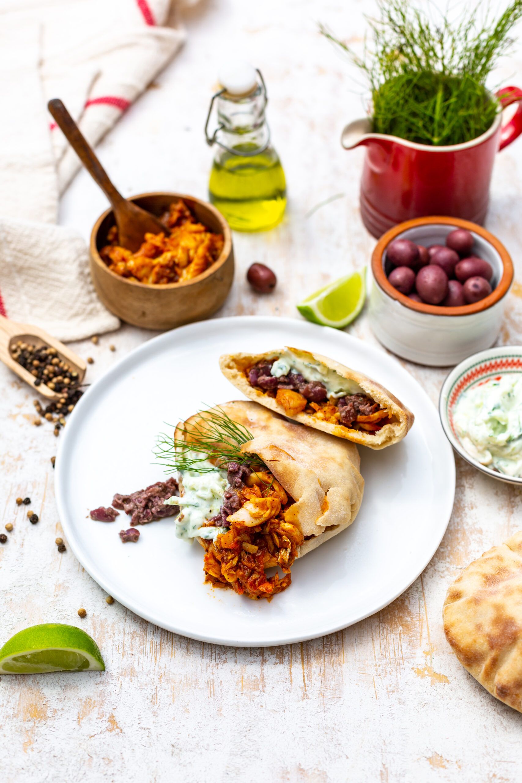 Shakshuka-Style Hake Pitas with Fennel Tzatziki and Olive Tapenade