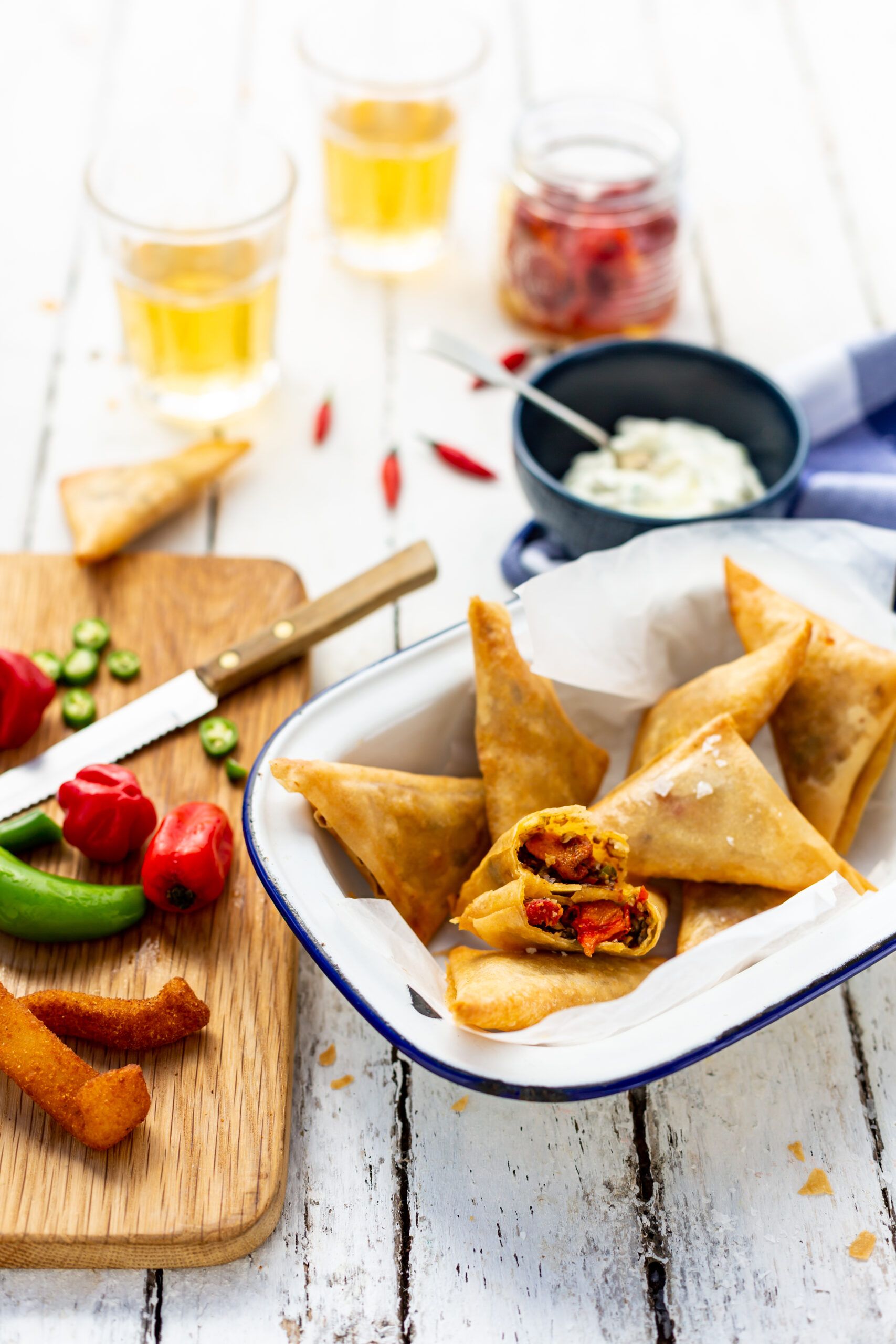 Sundried Tomato and Chilli-Spiced Fish Samoosas with Coriander Tzatziki